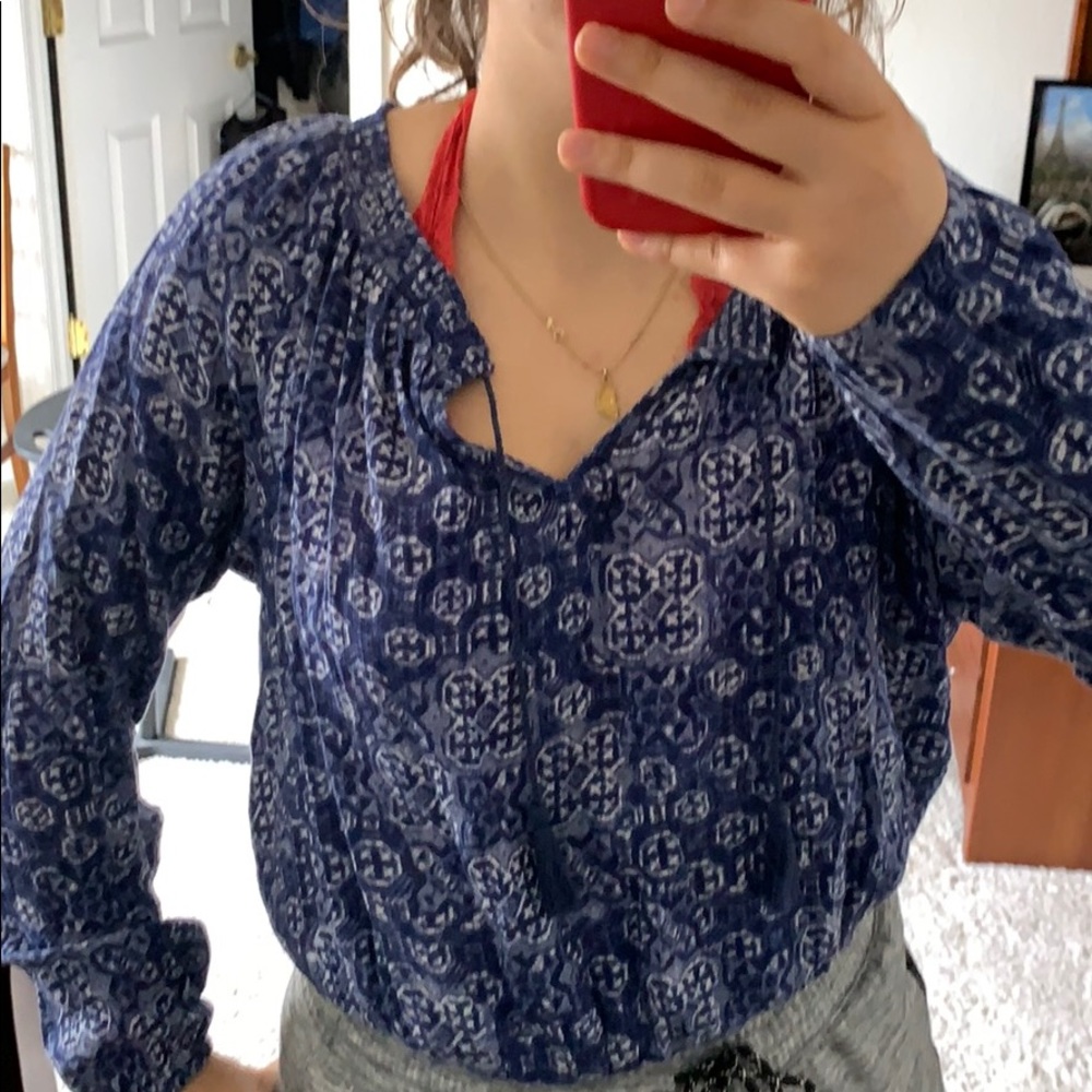 flowy patterned blue long sleeve blouse